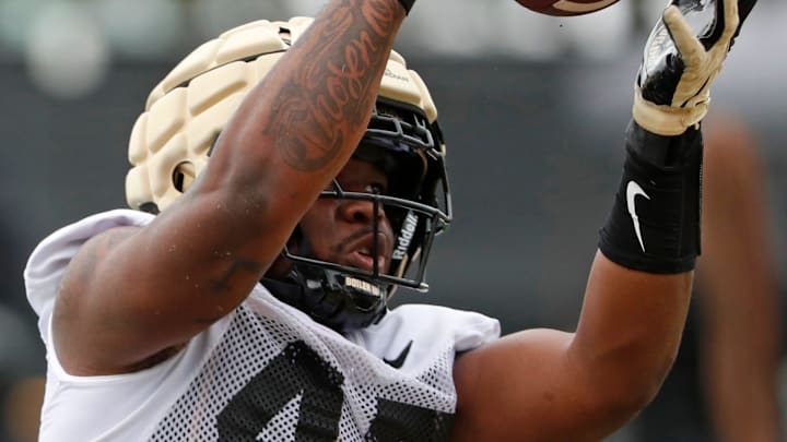 Purdue Boilermakers defensive end Jamari Payne (47) catches a throw 