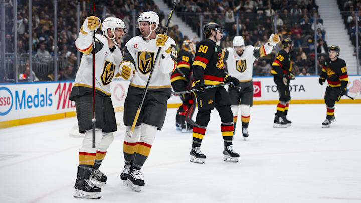 Cole Smith and Nic Dowd celebrate the former's third-period, game-winning goal. Cole Smith and Nic Dowd celebrate the former's third-period, game-winning goal.