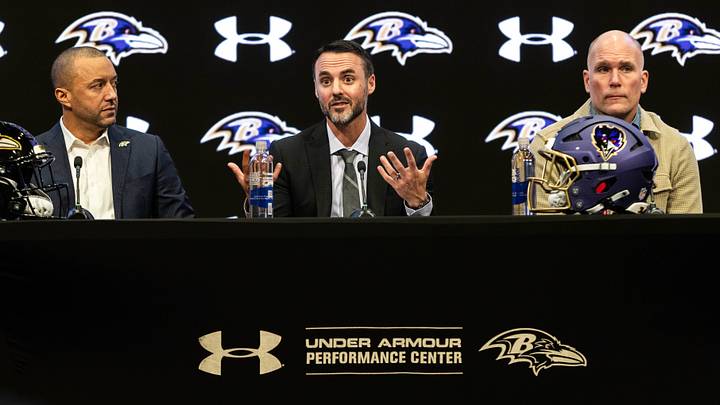 Jan 29, 2026; Owings Mills, MD, USA; Sashi Brown, Jesse Minter, and Eric DeCosta on the podium at the press conference introducing Jesse Minter at Under Armour Performance Center. Mandatory Credit: Lexi Thompson-Imagn Images