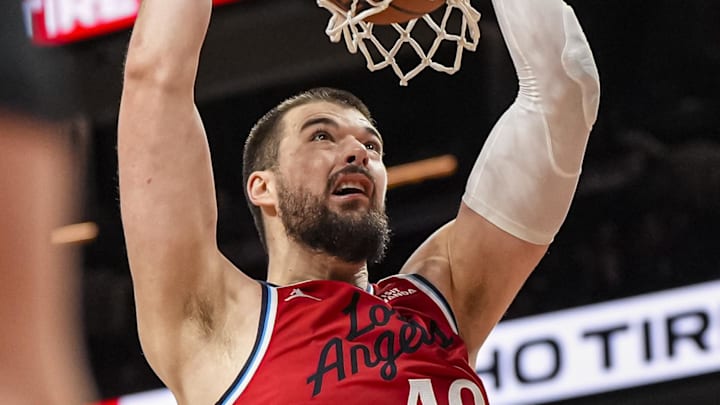 Dec 3, 2025; Atlanta, Georgia, USA; LA Clippers center Ivica Zubac (40) dunks against the Atlanta Hawks during the second half at State Farm Arena. Mandatory Credit: Dale Zanine-Imagn Images