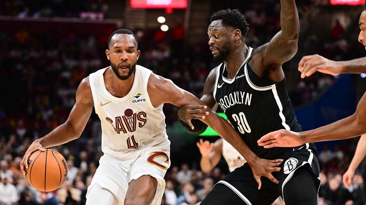 Oct 24, 2026; Cleveland, Ohio, USA; Cleveland Cavaliers center Evan Mobley (4) drives to the basket against Brooklyn Nets forward Julius Randle (30) during the second half at Rocket Arena. Mandatory Credit: Ken Blaze-Imagn Images