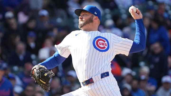 Apr 18, 2026; Chicago, Illinois, USA; Chicago Cubs pitcher Caleb Thielbar (24) throws the ball against the New York Mets during the ninth inning at Wrigley Field. Mandatory Credit: David Banks-Imagn Images