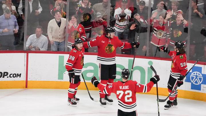 Apr 15, 2026; Chicago, Illinois, USA; Chicago Blackhawks defenseman Louis Crevier (46) celebrates his goal against the San Jose Sharks during the third period at United Center. Mandatory Credit: David Banks-Imagn Images