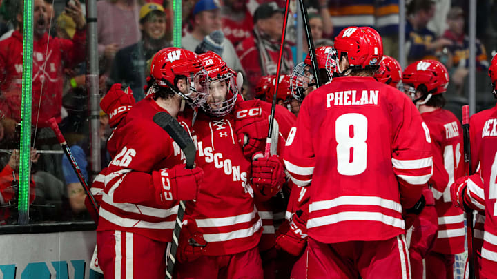 Apr 9, 2026; Las Vegas, Nevada, UNITED STATES; Wisconsin Badgers defenseman Aiden Dubinsky (28) celebrates defeating North Dakota Fighting Hawks in the semifinals of the NCAA men's ice hockey Frozen Four at T-Mobile Arena. Mandatory Credit: Stephen R. Sylvanie-Imagn Images Apr 9, 2026; Las Vegas, Nevada, UNITED STATES; Wisconsin Badgers defenseman Aiden Dubinsky (28) celebrates defeating North Dakota Fighting Hawks in the semifinals of the NCAA men's ice hockey Frozen Four at T-Mobile Arena. Mandatory Credit: Stephen R. Sylvanie-Imagn Images