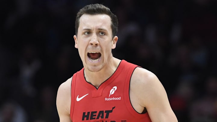 Nov 27, 2024; Charlotte, North Carolina, USA;  Miami Heat forward Duncan Robinson (55) reacts after scoring during the second half against the Charlotte Hornets at the Spectrum Center. Mandatory Credit: Sam Sharpe-Imagn Images