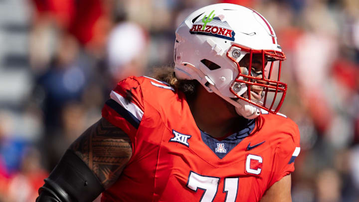 Oct 19, 2024; Tucson, Arizona, USA; Arizona Wildcats offensive lineman Jonah Savaiinaea (71) against the Colorado Buffalos at Arizona Stadium. Oct 19, 2024; Tucson, Arizona, USA; Arizona Wildcats offensive lineman Jonah Savaiinaea (71) against the Colorado Buffalos at Arizona Stadium.