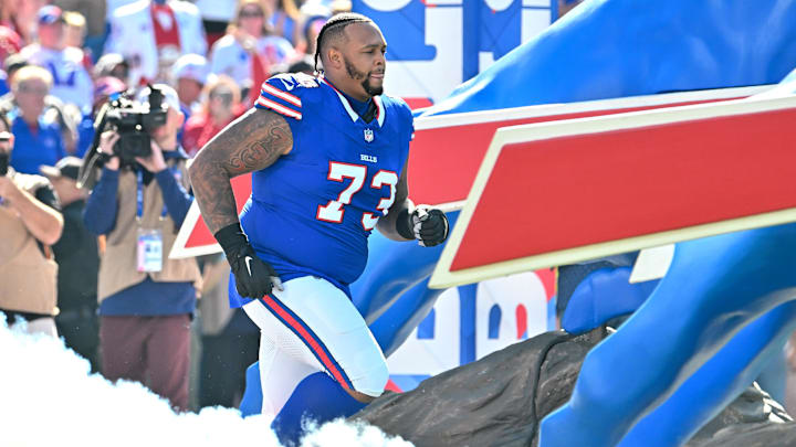 Buffalo Bills offensive tackle Dion Dawkins enters the field before a game against the Tennessee Titans Buffalo Bills offensive tackle Dion Dawkins enters the field before a game against the Tennessee Titans