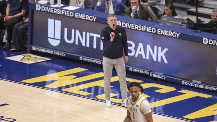 Mar 6, 2026; Morgantown, West Virginia, USA; West Virginia Mountaineers head coach Ross Hodge yells from the sideline during the first half against the UCF Knights at Hope Coliseum. 
