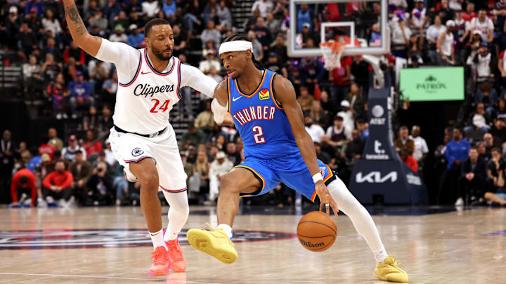 Oklahoma City Thunder guard Shai Gilgeous-Alexander (2) drives against LA Clippers guard Norman Powell (24) during the 4th quarter at Intuit Dome. 
