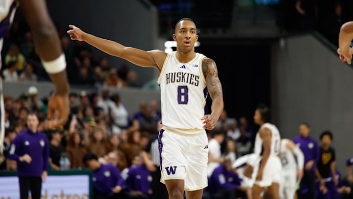 Nov 9, 2025; Waco, Texas, USA;  Washington Huskies forward Bryson Tucker (8) reacts to a call against the Baylor Bears during the first half at Paul and Alejandra Foster Pavilion. Mandatory Credit: Chris Jones-Imagn Images