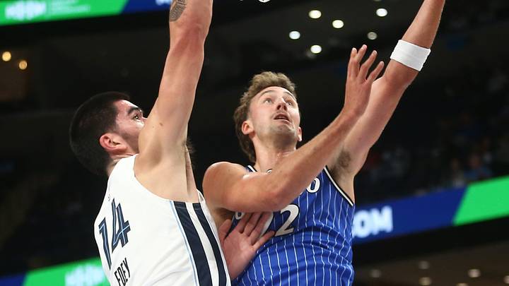 Oct 7, 2026; Memphis, Tennessee, USA; Orlando Magic forward Franz Wagner (22) drives to the basket as Memphis Grizzlies center Zach Edey (14) defends during the first quarter at FedExForum. Mandatory Credit: Petre Thomas-Imagn Images Oct 7, 2026; Memphis, Tennessee, USA; Orlando Magic forward Franz Wagner (22) drives to the basket as Memphis Grizzlies center Zach Edey (14) defends during the first quarter at FedExForum. Mandatory Credit: Petre Thomas-Imagn Images