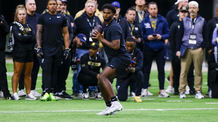 Apr 4, 2025; Boulder, CO, USA; Colorado Buffaloes quarterback Shedeur Sanders (2) looks to make a pass at the University of Colorado NFL Showcase at the CU Indoor Practice Facility. Mandatory Credit: Michael Ciaglo-Imagn Images