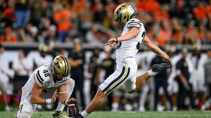 Purdue Boilermakers place kicker Spencer Porath (35) kicks an extra point