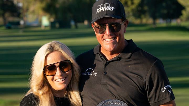 Nov 14, 2021; Phoenix, Arizona, USA; Phil Mickelson (right) with wife Amy Mickelson (left) celebrate after winning the final round of the Charles Schwab Cup Championship golf tournament at Phoenix Country Club. Nov 14, 2021; Phoenix, Arizona, USA; Phil Mickelson (right) with wife Amy Mickelson (left) celebrate after winning the final round of the Charles Schwab Cup Championship golf tournament at Phoenix Country Club.
