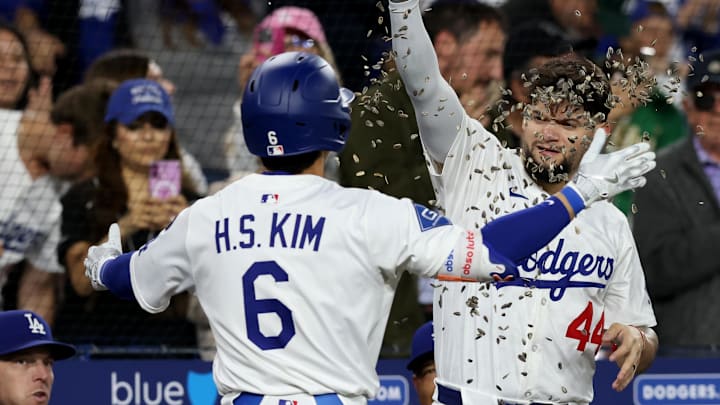 Dodgers second baseman Hyeseong Kim (6) celebrates with outfielder Andy Pages (44) and outfielder Teoscar Hernández (37) after hitting a home run during the fifth inning against the Athletics at Dodger Stadium. 
