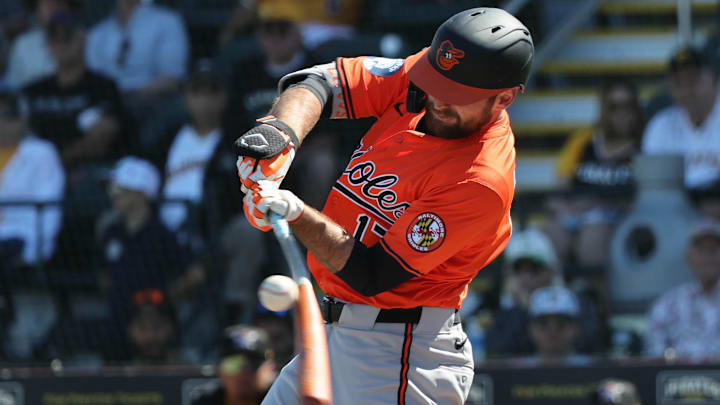 Feb 26, 2025; Bradenton, Florida, USA; Baltimore Orioles outfielder Colton Cowser (17) singles during the fourth inning against the Pittsburgh Pirates at LECOM Park.