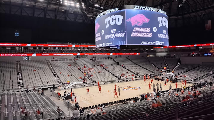 The Arkansas Razorbacks take in the final moments of their warm-up at Dickies Arena 45 minutes before an exhibition game against the TCU Horned Frogs in Fort Worth.