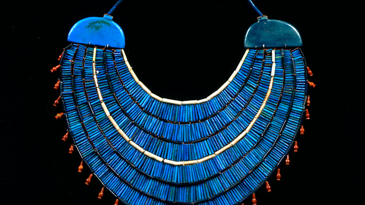 We invented jewelry (such as this ancient Egyptian beaded necklace) before we invented the wheel.