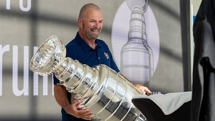 Panthers General Manager Bill Zito places the Stanley Cup on a table on Wednesday August 14, 2024 at Fiserv Forum in Milwaukee, Wis. Panthers General Manager Bill Zito places the Stanley Cup on a table on Wednesday August 14, 2024 at Fiserv Forum in Milwaukee, Wis.