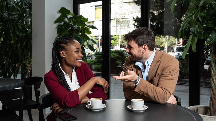 Man and a woman having coffee Man and a woman having coffee