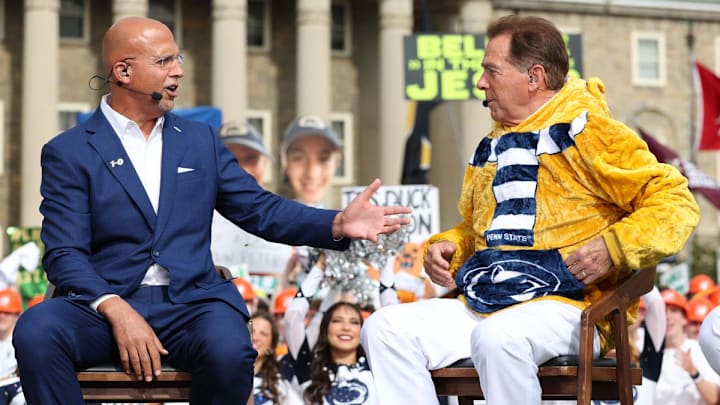 Penn State coach James Franklin talks with Nick Saban on the set of ESPN College GameDay before the Penn State-Oregon game.