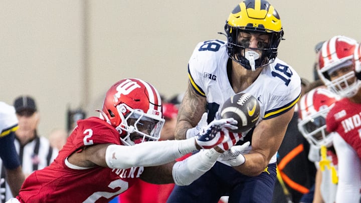 Nov 9, 2024; Bloomington, Indiana, USA; Indiana Hoosiers linebacker Jailin Walker (2) deflects the pass so Michigan Wolverines tight end Colston Loveland (18) can’t catch the ball in the second quarter at Memorial Stadium. 