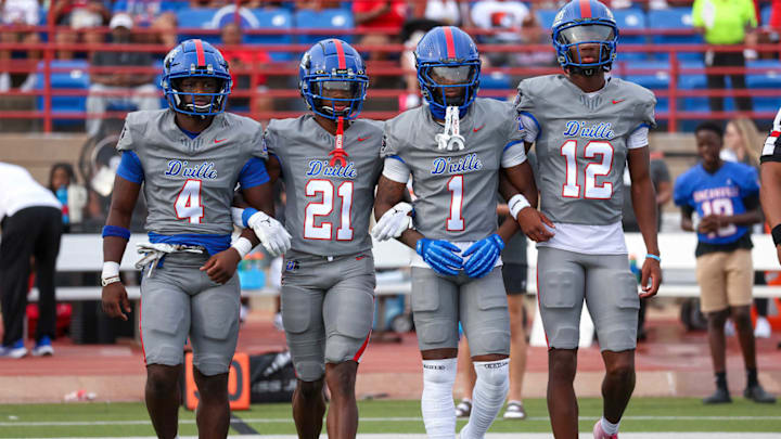 Duncanville captains take field in Texas for ranked high school showdown with Maryland's St. Frances Academy on Sept. 14, 2024.