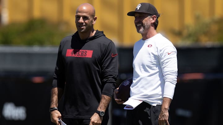 May 9, 2025; Santa Clara, CA, USA; San Francisco 49ers head coach Kyle Shanahan, right, confers with defensive coordinator Robert Saleh during the teamís rookie minicamp.