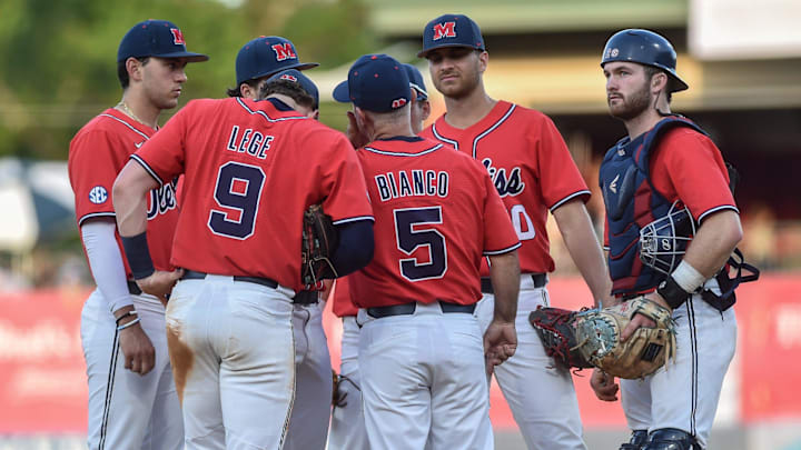 Head coach Mike Bianco (5) huddles with his players during the Ole Miss vs. Mississippi State Governor's Cup baseball game at Trustmark Park in Pearl, Miss., Tuesday, April 25, 2023.

TCL OleMissvMSU205