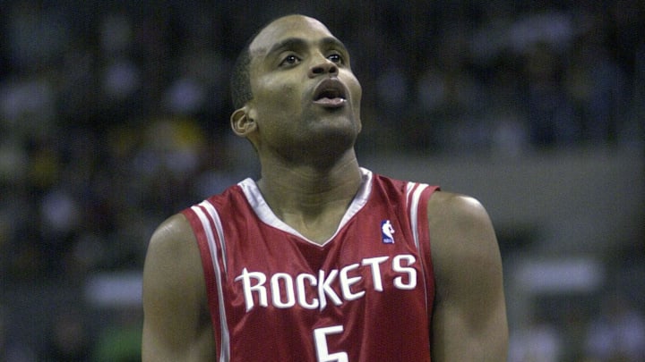 Dec 25, 2003; Los Angeles, CA, USA: Houston Rockets guard Cuttino Mobley (5) shoots a free throw against the Los Angeles Lakers at the Staples Center. The Rockets defeated the Lakers 99-87. Mandatory Credit: Kirby Lee/Image of Sport-Imagn Images