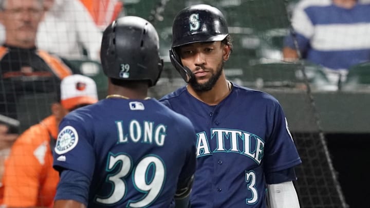 Sep 21, 2019; Baltimore, MD, USA; Seattle Mariners outfielder Shed Long (39) is greeted by shortstop JP Crawford (3) after hitting a solo home run against the Baltimore Orioles during the third inning at Oriole Park at Camden Yards. Mandatory Credit: Mitch Stringer-Imagn Images Sep 21, 2019; Baltimore, MD, USA; Seattle Mariners outfielder Shed Long (39) is greeted by shortstop JP Crawford (3) after hitting a solo home run against the Baltimore Orioles during the third inning at Oriole Park at Camden Yards. Mandatory Credit: Mitch Stringer-Imagn Images