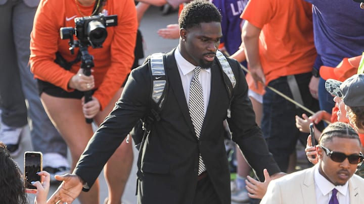 Clemson Tigers running back Phil Mafah greets fans during Tiger Walk before a game against the Louisville Cardinals.