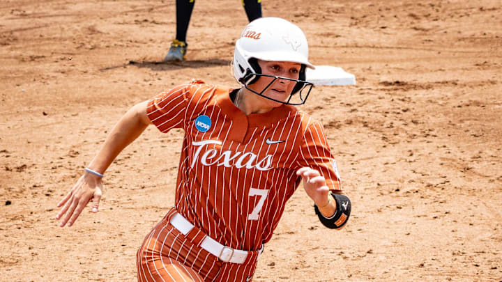 Texas Longhorns outfielder Ashton Maloney (7) runs for third on her way to score in the third inning as the Longhorns take on the Michigan Wolverines in the third game of the NCAA Tournament regional in Austin, May 17, 2025.