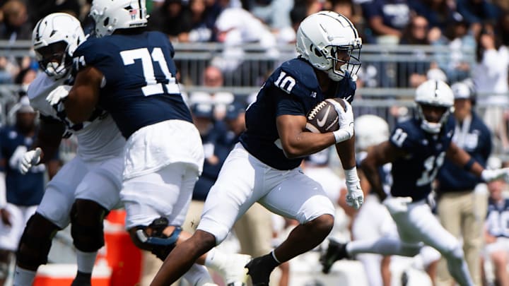 Penn State running back Nick Singleton carries the ball during the Blue-White game at Beaver Stadium on Saturday, April 26, 2025, in State College. The White team defeated the Blue team, 10-8.