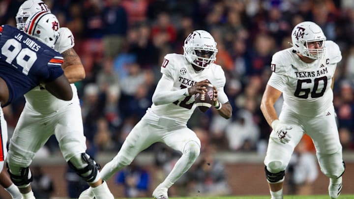 Texas A&M Aggies quarterback Marcel Reed runs the ball 