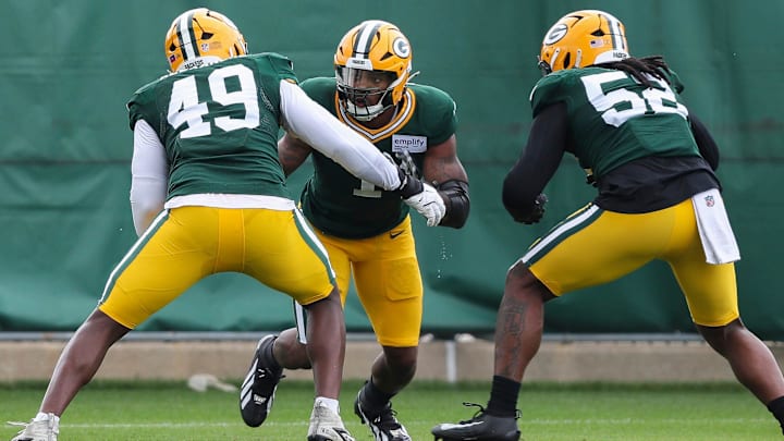 Green Bay Packers defensive linemen Deslin Alexandre (49), Micah Parsons (1) and Rashan Gary (52) run through a drill during practice on Wednesday, September 3, 2025, at Clarke Hinkle Field in Ashwaubenon, Wis.