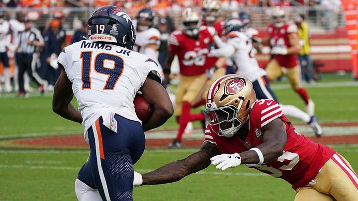Oct 4, 2026; Santa Clara, California, USA; Denver Broncos wide receiver Marvin Mims Jr. (19) avoids the tackle attempt by San Francisco 49ers defensive back Siran Neal (33) at Levi's Stadium. Oct 4, 2026; Santa Clara, California, USA; Denver Broncos wide receiver Marvin Mims Jr. (19) avoids the tackle attempt by San Francisco 49ers defensive back Siran Neal (33) at Levi's Stadium.