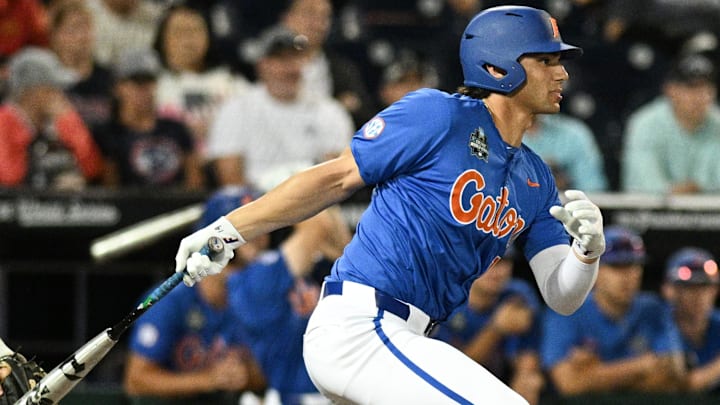 Florida Gators first baseman Jac Caglianone (14) singles in the Texas A&M Aggies during the eighth inning at Charles Schwab Field in Omaha, Neb., on Jun 14, 2024. Florida Gators first baseman Jac Caglianone (14) singles in the Texas A&M Aggies during the eighth inning at Charles Schwab Field in Omaha, Neb., on Jun 14, 2024.