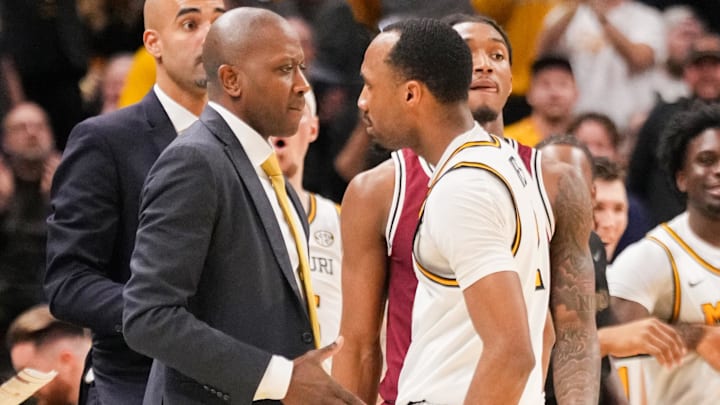 Feb 25, 2025; Columbia, Missouri, USA; Missouri Tigers head coach Dennis Gates celebrates with guard Tamar Bates (2) after a score against the South Carolina Gamecocks during the second half at Mizzou Arena. Mandatory Credit: Denny Medley-Imagn Images Feb 25, 2025; Columbia, Missouri, USA; Missouri Tigers head coach Dennis Gates celebrates with guard Tamar Bates (2) after a score against the South Carolina Gamecocks during the second half at Mizzou Arena. Mandatory Credit: Denny Medley-Imagn Images
