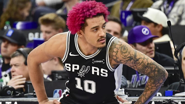 Jan 22, 2026; Salt Lake City, Utah, USA; San Antonio Spurs forward Jeremy Sochan (10) stretches before substituting in during the second half against the Utah Jazz at Delta Center.