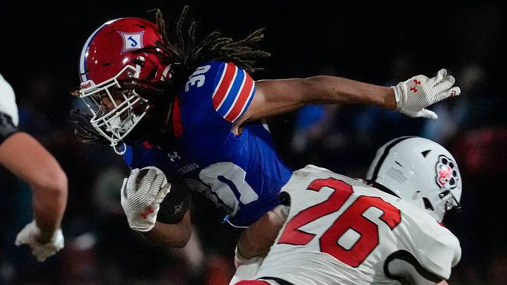 Jefferson's Carter Perrin (30) breaks past Jackson County's Noah Bade (26) during a GHSA high school football game against Jackson County in Jefferson, Georgia, on Friday, August 22, 2025. Mandatory Credit: Joshua L. Jones, Athens Banner-Herald USA TODAY NETWORK Jefferson's Carter Perrin (30) breaks past Jackson County's Noah Bade (26) during a GHSA high school football game against Jackson County in Jefferson, Georgia, on Friday, August 22, 2025. Mandatory Credit: Joshua L. Jones, Athens Banner-Herald USA TODAY NETWORK