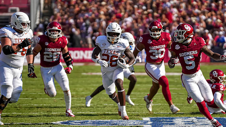 Texas Longhorns running back Quintrevion Wisner (26) runs the ball during the Red River Rivalry game against Oklahoma at the Cotton Bowl on Saturday, Oct. 12, 2024 in Dallas, Texas.