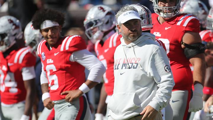 Mississippi Rebels head coach Pete Golding and quarterback Trinidad Chambliss look back before the game against the Missouri Tigers at Vaught-Hemingway Stadium.  Mandatory Credit: Petre Thomas-Imagn Images