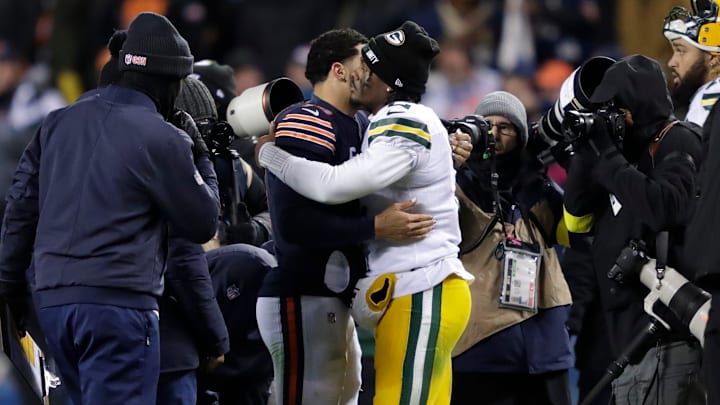 Chicago Bears quarterback Caleb Williams (18) and Green Bay Packers quarterback Malik Willis (2) embrace at the end of their football game Saturday, December 20, 2025, at Soldier Field in Chicago, Illinois.