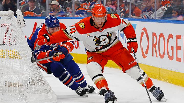 Apr 28, 2026; Edmonton, Alberta, CAN; Anaheim Ducks defensemen John Carlson (74) protects the puck from Edmonton Oilers forward Zach Hyman (18) during the third period in game five of the first round of the 2026 Stanley Cup Playoffs at Rogers Place. Mandatory Credit: Perry Nelson-Imagn Images Apr 28, 2026; Edmonton, Alberta, CAN; Anaheim Ducks defensemen John Carlson (74) protects the puck from Edmonton Oilers forward Zach Hyman (18) during the third period in game five of the first round of the 2026 Stanley Cup Playoffs at Rogers Place. Mandatory Credit: Perry Nelson-Imagn Images