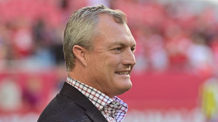 Jan 5, 2025; Glendale, Arizona, USA; San Francisco 49ers general manager John Lynch looks on prior to the game against the Arizona Cardinals at State Farm Stadium. Mandatory Credit: Matt Kartozian-Imagn Images