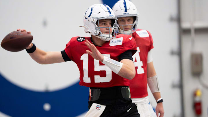 Indianapolis Colts quarterback Riley Leonard (15) delivers a pass Wednesday, Dec. 10, 2025, during practice at the Colts training facility in Indianapolis.