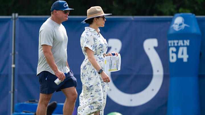 Chris Ballard, Indianapolis Colts general manager, talks Friday, July 25, 2025, with Colts owner Carlie Irsay-Gordon during training camp held at Grand Park in Westfield.