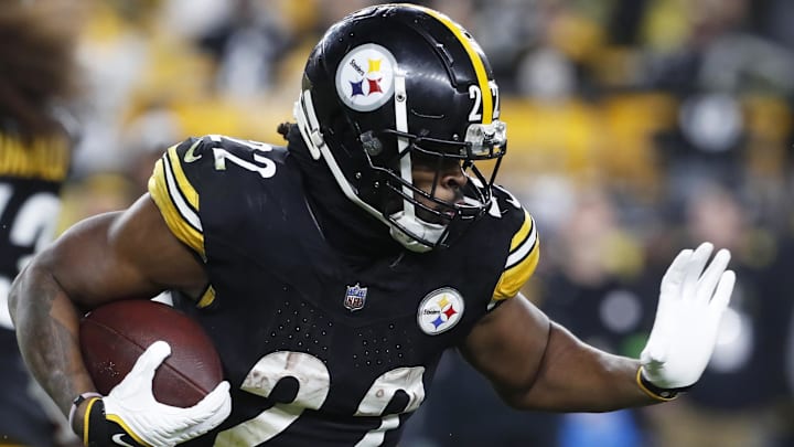 Dec 23, 2023; Pittsburgh, Pennsylvania, USA;  Pittsburgh Steelers running back Najee Harris (22) runs the ball against the Cincinnati Bengals during the third quarter at Acrisure Stadium. Pittsburgh won 34-11. Mandatory Credit: Charles LeClaire-USA TODAY Sports