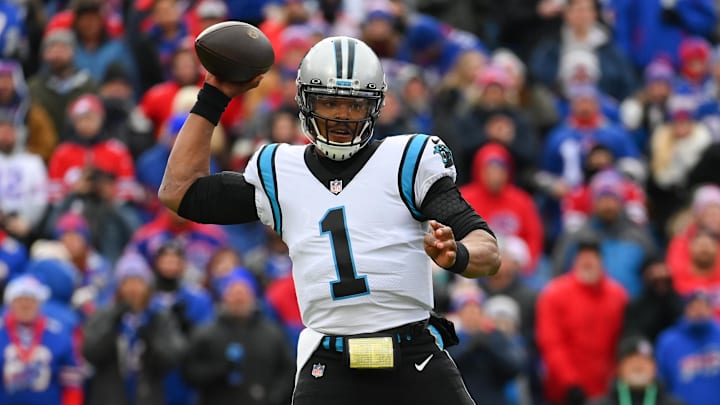 Dec 19, 2021; Orchard Park, New York, USA; Carolina Panthers quarterback Cam Newton (1) passes the ball against the Buffalo Bills during the first half at Highmark Stadium. Mandatory Credit: Rich Barnes-Imagn Images